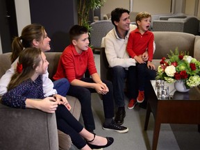Justin Trudeau and wife Sophie Gregoire-Trudeau, and children Xavier, Ella-Grace and Hadrien (right) watch election results in Montreal on Monday, Oct. 21, 2019. Both Prime Minister Trudeau and Conservative Leader Andrew Scheer are fighting off criticism they're asking Canadians to do more to stop the spread of COVID-19 than they're willing to do themselves.THE CANADIAN PRESS/Sean Kilpatrick