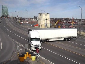 Surveillance cameras caught the driver of a 53-foot semi-trailer truck coming from the South Shore making a U-turn on the Jacques Cartier Bridge near the near the Parc Jean-Drapeau exit on Wednesday around 9:30 a.m.