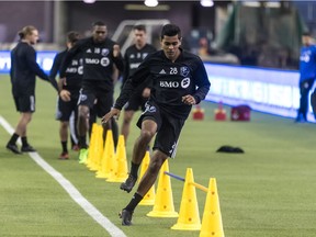 Impact midfielder Shamit Shome (No. 28) goes through drill during practice at Olympic Stadium in Montreal on Feb. 1, 2018.