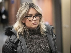 Alison De Courcy-Ireland leaves a Montreal courtroom on Feb. 7, 2019. De Courcy-Ireland is the woman charged with being impaired while behind the wheel of a truck owned by former Montreal Canadien Zach Kassian.