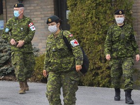 Canadian Armed Forces personnel leave a Laval seniors' residence after meeting with staff in April. CISSS de Laval representative Judith Goudreau says the health authority received a boost from the army, the Canadian Red Cross, St. John Ambulance and workers from the CHU de Québec.