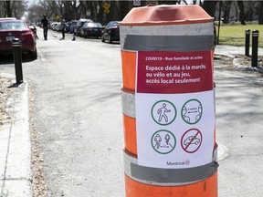 In addition to pedestrian corridors like this one on Monkland Ave., Montreal is designating three "family and active streets" where residents can enjoy the good weather while respecting the rules of social distancing.