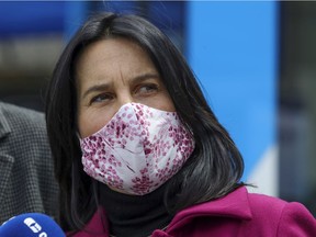 Ensemble Montreal's Lionel Perez criticized Mayor Valérie Plante, here wearing a mask at the unveiling of COVID-19 test sites in refitted STM vehicles, for "strongly recommending" rather than ordering that masks be worn.