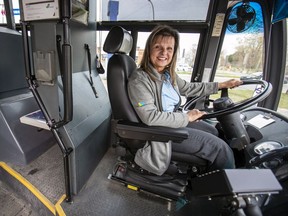 STM bus driver Jocelyne Dubé pulls into her last stop of the day at the end of her shift driving the No. 123 bus in the Lachine borough of Montreal on May 6, 2020.