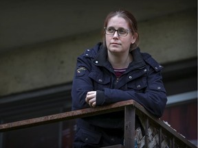 Kristy-Lyn Kemp on the balcony of her apartment where she is in quarantine in Dorval. She must get two clear tests before being able to start her new job.