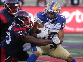 Alouettes linebacker Henoc Muamba tackles Winnipeg Blue Bombers' Nic Demski during CFL game at Molson Stadium in Montreal on Sept. 21, 2019.