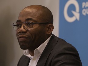 Parti Québécois president Dieudonné Ella Oyono speaks at a PQ press event to announce a new leadership race at St-Pierre Centre in Montreal on Feb. 1, 2020.