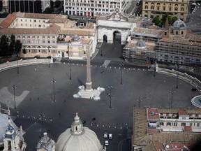 This aerial photograph taken on May 1, 2020, shows the empty Piazza del Popolo in Rome during the country's lockdown aimed at curbing the spread of the COVID-19 (the novel coronavirus).