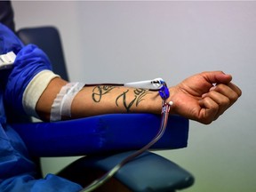 A man donates plasma at El Cruce hospital, in Florencio Varela, Buenos Aires province, Argentina, on May 14, 2020.