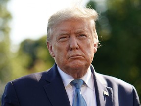 U.S. President Donald Trump arrives to speak to the press before departing from the South Lawn of the White House in Washington, DC on May 15, 2020.