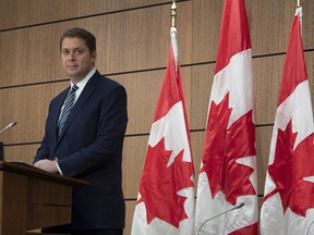 Leader of the Opposition Andrew Scheer listens to a question during a news conference Tuesday May 19, 2020 in Ottawa.