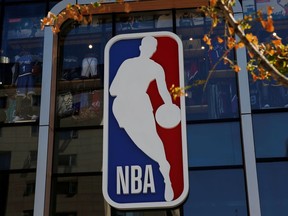 An NBA logo is seen on the facade of its flagship store at the Wangfujing shopping street in Beijing, China on Oct. 8, 2019.