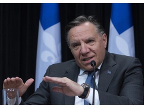 Quebec Premier François Legault responds to reporters during a news conference on the COVID-19 pandemic, Monday, May 4, 2020 at the legislature in Quebec City. The government is rushing the timeline for reopening, MNA Gregory Kelley says.