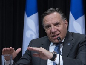 Premier François Legault responds to reporters during a news conference on the COVID-19 pandemic, Monday, May 4, 2020 at the legislature in Quebec City. "Premier François Legault and his team have provided no clear indication of having drawn the obvious lesson — that a comprehensive Quebec government plan to communicate in English during an emergency is both essential and long overdue," Geoffrey Chambers writes.