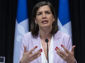 Quebec Deputy premier and Public Security Minister Genevieve Guilbault responds to reporters during a news conference on the COVID-19 pandemic, Wednesday, May 6, 2020 at the legislature in Quebec City.