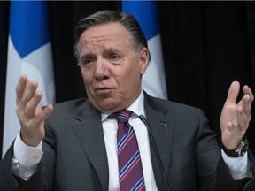 Quebec Premier François Legault responds to reporters during a news conference on the COVID-19 pandemic, Monday, May 11, 2020 at the legislature in Quebec City.