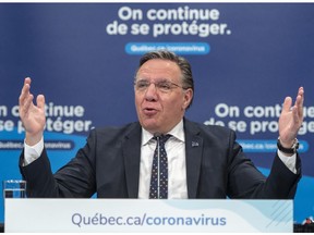 Quebec Premier François Legault speaks to the media at the daily COVID-19 press briefing May 21, 2020, in Montreal.