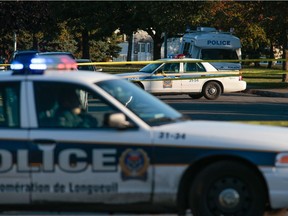 Longueuil police vehicles.