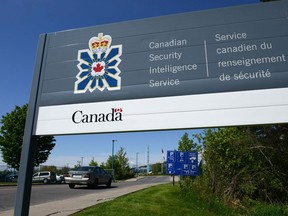 A sign for the Canadian Security Intelligence Service building is shown in Ottawa on May 14, 2013. Canada's spy agency has warned the Trudeau government that proposed changes to bolster privacy could undermine the ability of intelligence agents to collect and use information about citizens. In a 14-page submission to the Justice Department, the Canadian Security Intelligence Service recommends any reforms include special language that takes into account "the critical public interest in national security activities" carried out by CSIS.