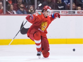 Russia's Alexander Romanov celebrates his goal against Denmark during world junior championship in Vancouver on Dec. 27, 2018.