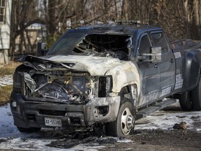 A burned-out tow truck in a residential area on in Richmond Hill, Ont. on Monday, Dec. 23, 2019.