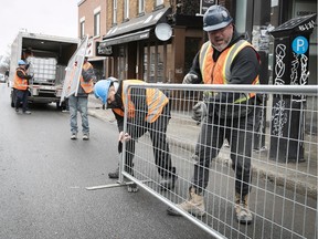 April 2020: Workers put up "pedestrian corridor" barriers on Mont-Royal Ave. in an effort to facilitate social distancing.
