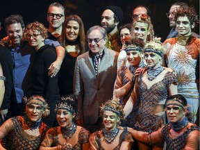 Cirque du Soleil President and CEO Daniel Lamarre (centre) joins cast and creative team members onstage following a preview of their classic show Alegria in Montreal on April 10, 2019.