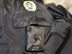 A body camera on a police vest is photographed during the launch of a pilot project on May 18, 2016 at Montreal city hall.