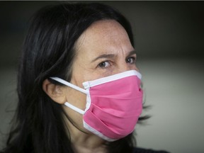 Montreal Mayor Valérie Plante wears a pink mask during her mask give away at the Langelier métro station on Monday May 25, 2020.