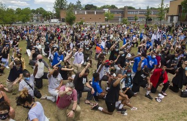 Solidarity at Montreal Kneels for Change event at Loyola park in Montreal on Sunday, June 7, 2020.