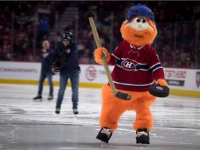 MONTREAL, QUE.: JANUARY 20, 2019-- Youppi gets ready to make a shot during a skills competition in Montreal on Sunday January 20, 2019. (Allen McInnis / MONTREAL GAZETTE) ORG XMIT: 62001