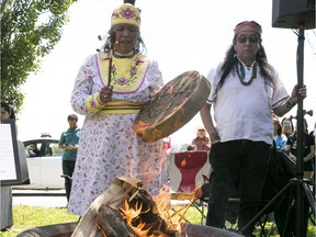 Mohawk elders perform traditional songs, following the lighting of fire, during ceremonies marking National Indigenous Peoples Day in Montreal in 2019.