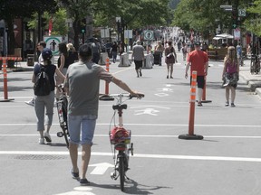 The new walkway on Mont-Royal attracted pedestrians the morning of St-Jean Baptiste Day, 2020.