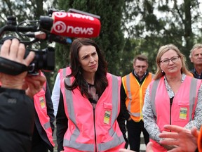 Prime Minister Jacinda Ardern meets and talks to staff during the visit to Trevelyans Kiwifruit and Avocado Packhouse on June 09, 2020 in Tauranga, New Zealand. COVID-19 restrictions were lifted from midnight as New Zealand moved to COVID-19 Alert Level 1 as the government confirmed there are zero active cases in the country. The lifting of restrictions under Alert Level 1 will see life mostly return to normal in New Zealand, however strict border measures will remain with mandatory isolation and quarantine for any overseas arrivals. New Zealanders are also being asked to keep diaries in the event of a second wave of infections.