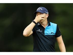 Matt Wallace of England reacts on the fourth green during the second round of the Travelers Championship at TPC River Highlands on Friday, June 26, 2020, in Cromwell, Conn. Wallace is playing alone after the other two members of his group, Denny McCarthy and Bud Cauley, withdrew from the Travelers Championship on Friday. McCarthy withdrew because of a positive COVID-19 test, while Cauley withdrew out of precaution.