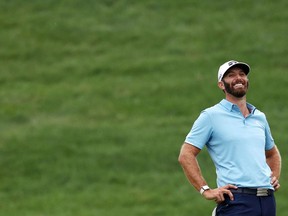 Dustin Johnson of the United States reacts after making a putt for par on the 18th green to win the Travelers Championship at TPC River Highlands on Sunday, June 28, 2020, in Cromwell, Conn.