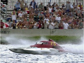 A finalist in the annual Valleyfield Regatta speeds past a crowded grandstand in 2003,