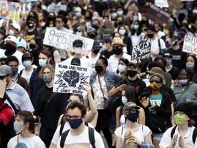 MONTREAL, QUE.: June 7, 2020 --Thousands of people take part in an anti racism and anti police brutality march in Montreal, on Sunday, June 7, 2020. (Allen McInnis / MONTREAL GAZETTE) ORG XMIT: 64546