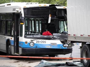 An STM bus rear-ended a tractor trailer that was stopped at a red light, in Montreal June 29, 2020.