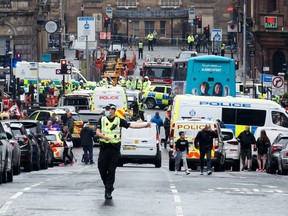 Scottish police on Friday said armed officers shot dead a man after a suspected stabbing in Glasgow left six others injured, including one of their colleagues.  The incident happened in and around a Park Inn hotel on West George Street, in the heart of the city. Several roads were closed and the surrounding area was cordoned off.