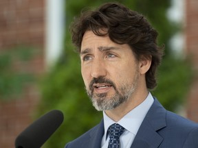 Prime Minister Justin Trudeau delivers his opening remarks during a news conference outside Rideau Cottage in Ottawa, Monday June 22, 2020.