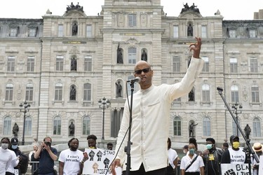 Quebec rap singer Webster speaks at a demonstration to denounce police violence, Sunday, June 7, 2020 in front of the legislature in Quebec City. A few thousand people peacefully gathered.