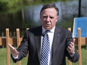 Quebec Premier François Legault responds to a question during a news conference in Orford, Que. on Friday, June 5, 2020.