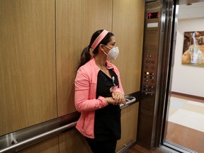 Co-director of the intensive care unit at CommonSpirit's Dignity Health California Hospital Medical Center, Dr. Zafia Anklesaria, 35, who is seven months pregnant, arrives at work to treat patients in the intensive care unit, during the coronavirus disease (COVID-19) outbreak, in Los Angeles, California, U.S., May 18, 2020.  REUTERS/Lucy Nicholson