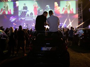 People attend a drive-in concert by Natassa Theodoridou near Athens, Greece, on June 2, 2020.
