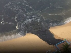 "Black water" flows into Acapulco Bay in Acapulco, Guerrero, Mexico June 25, 2020 in this picture obtained from social media. Picture taken June 25, 2020.