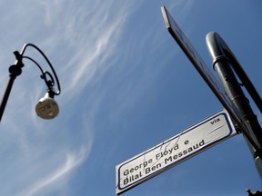 The street sign for ''Via dell'Amba Aradam'', named after the Battle of Amba Aradam, when Italy attacked Ethiopia in 1936, has been replaced by protesters against racism with a sticker reading ''Via George Floyd and Bilal Ben Messaud'', to honour the death of Floyd in police custody, and migrant Messaud who died after jumping from a quarantined ship near Sicily, in Rome, Italy, June 19, 2020.