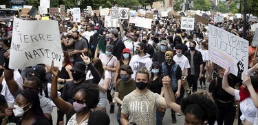 Thousands of people take part in march against racism and police brutality in Montreal on Sunday, June 7, 2020.