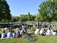 People enjoy the sunny weather in Tantolunden park in Stockholm on May 30, 2020, amid the novel coronavirus pandemic.