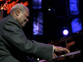 Canadian jazz legend Oscar Peterson performs on the Stravinski hall stage during the 39th Montreux Jazz Festival in Montreux, Switzerland, Saturday, July 16, 2005. The widow of legendary jazz pianist Peterson says she is heartened by a petition calling for Montreal to rename a metro station in his honour.